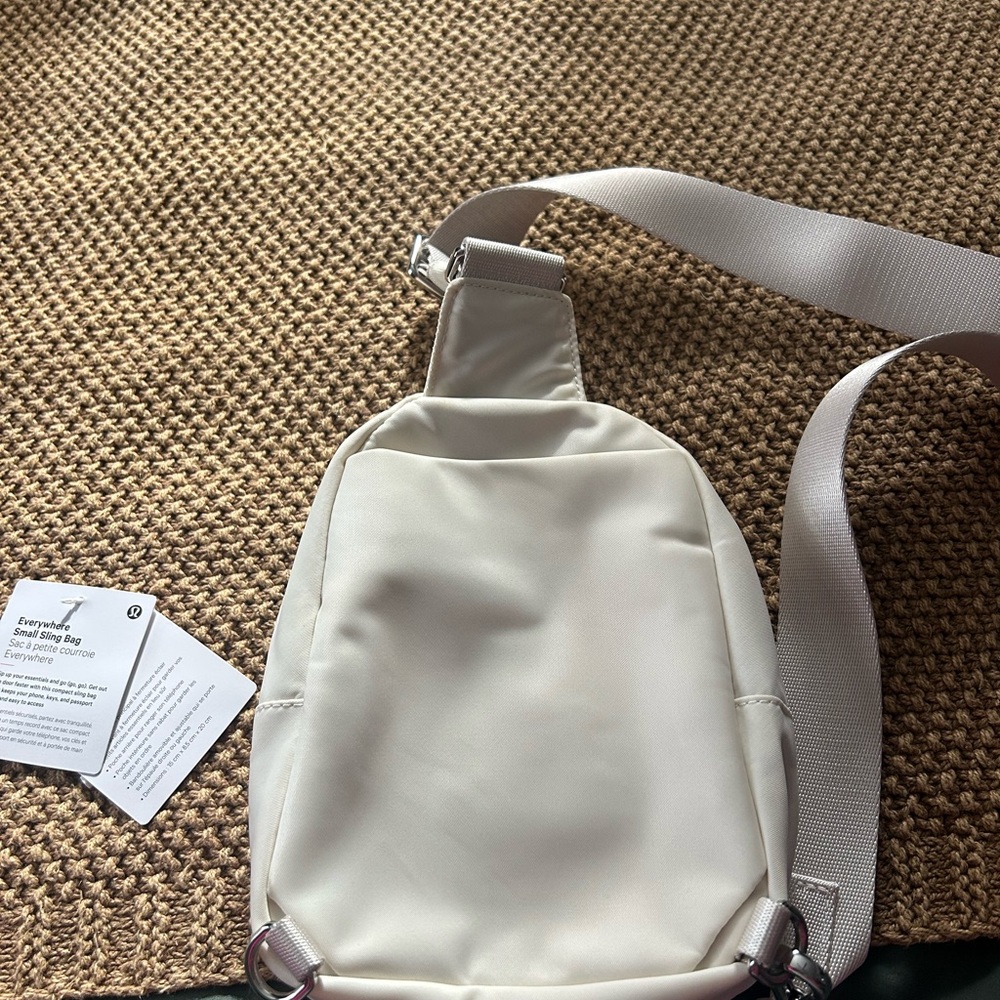 Lululemon Light Ivory sling Bag - Picture 2 of 11